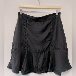 Black peplum mini skirt